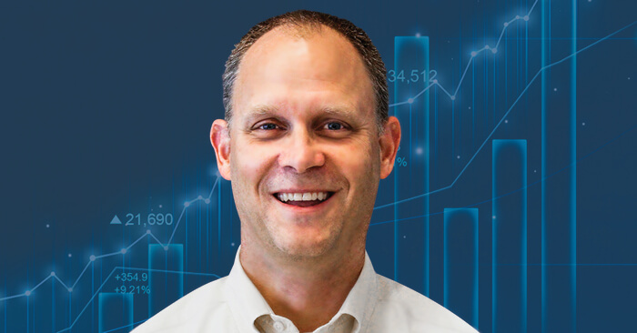John Keller with blue tech background
